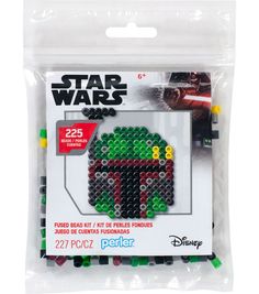 the lego star wars character has been made out of plastic beads and is packaged in a package