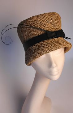 The Bee's Knees has modern styling with a vintage-inspired cloche silhouette.  Twisted sea grass with leather hat band and curled feather quills. Unusual Hats, Historical Hats, Dressy Hats, Vintage Style Hat, Veiled Hats, Victorian Hats, Couture Hats, Retro Hats, Bee's Knees