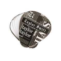 four black and white tags with the word taylor on them, all in different languages