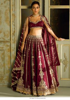 Bollywood Replica LehengaBollywood Model Maroon Kasturi silk heavy wedding lehenga choliLehenga Kasturi Silk Lehenga with Sequence, Dori & Zari Work with Flair 3 + Mtrs, Can-Can Attached.Blouse Kasturi Silk Blouse with Zari, Sequence & Dori Work All Over Front & Back as  Unstitched  Fabric Dupatta  Kasturi Silk Dupatta with Sequence, Dori & Zari Work Shipping time is 5-7 days.Buy this Lehenga at Kollybollyethnics and make your occasion very special !!. With Express Free Shipping and Custom Stitching, Shop Bollywood Model Maroon Kasturi silk heavy wedding lehenga choli online at kollybollyethnics from India with free worldwide shipping. Luxury Wedding Navratri Blouse Piece, Floor-length Dola Silk Palazzo Set For Reception, Unstitched Dabka Work Lehenga For Eid, Unstitched Festive Lehenga With Resham Embroidery, Semi-stitched Bollywood Chinon Set, Festive Party Wear Sharara With Unstitched Blouse, Bollywood Style Semi-stitched Chinon Set, Festive Dola Silk Sharara For Party Wear, Festive Floor-length Dola Silk Sets