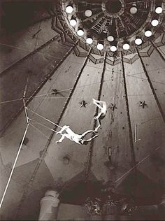 an overhead view of the ceiling in a building with many lights and decorations on it