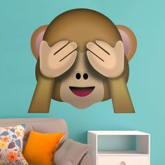 a sticker with a monkey covering its eyes