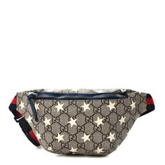 This is an authentic GUCCI GG Supreme Monogram Stars Childrens Belt Bag. This belt bag is crafted of printed Gucci GG supreme monogram canvas with on overlay of white stars. This bag has a blue and red nylon web belt that can be worn as a belt bag on the hip or waist. The main zipper opens to a navy blue nylon interior. Gucci Belt Bag, Web Belt, Gucci Monogram, Studded Belt, White Stars, Monogram Bag, Pocket Belt, Chain Belt, Gucci Belt