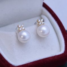 White 10-11mm Freshwater Pearl Shiny Earrings Crafted with 10-11mm purple freshwater pearls, these earrings will be a stand-out in any collection. With a timeless design, you will be able to enjoy these for many years. Perfect for day or evening wear, these earrings make a stunningly beautiful statement and are sure to draw admiring glances. This popular earrings design features AAAA quality, round freshwater pearls measuring 10-11mm. Material: Freshwater Pearl with 925 sterling silver or gold v Aaa Quality Drop Pearl Earrings, Exquisite Pearl Earrings For Gifts, Luxury Pearl Earrings With Pearl Pendant, Luxury Pearl Earrings With Pearl Charm, Elegant Akoya Pearl Earrings For Gift, Luxury Pearl Charm Earrings As Gift, Luxury Pearl Pendant Earrings, Luxury Round Pearl Drop Earrings, Luxury Pearl Pendant Earrings As Gift