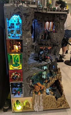 a display case with legos inside of it