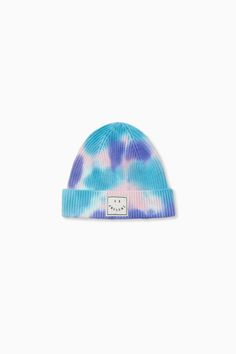 the tie dye beanie in blue, pink and white is shown on a white background