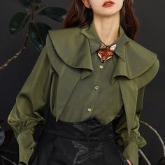 A blouse designed to look like a cloak. The tip of the collar is pointed, the collar has a multi-layer structure, and the cuffs have an original design. Available in 3 colors: dark green, white, and navy. This item will give you a cute adult look. 
 
 
 ＜Color＞ 
 
 Dark green 
 White 
 Navy 
 
 
 ＜Size＞ 
 
 S size 
 
 
 Length: 61cm 
 Shoulder width: 40cm 
 Bust: 91cm 
 Sleeve length: 65cm 
 
 M size 
 
 Length: 62cm 
 Shoulder width: 41cm 
 Bust: 95cm 
 Sleeve length: 66cm 
 
 L size 
 
 Length Princess Cloak, Fox Charm, Woodland Whimsy, Collar Tips, Jacquard Skirt, Cami Shirt, Mens Cardigan Sweater, Romper Pants, Embroidered Blouse