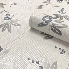 an image of a wallpaper with flowers and leaves in grey colors on white background