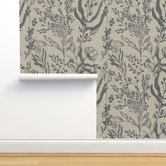 an image of a wallpaper with flowers and leaves on the wall next to it