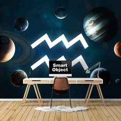 a desk with a computer on it in front of a wall that has planets and the words smart object