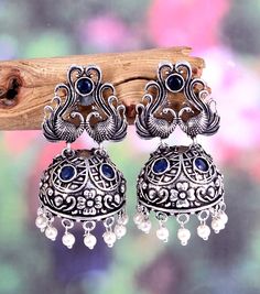 * Item  Description - * Material-  Silver plated Oxidised Earrings  * Weight -  28.00 Grams  * Inches -   2.0  Inches  * Length -  4.0 Centimeter  * Width -    2.0  centimeter  * Pattern -  Traditional wear, Party wear , Wedding gift, Daily wear, Casual Wear, birthday gift, anniversary gift ** Best price guaranteed ** We strive continuously to serve our customers better and keep updating our shop with new designs regularly .  We can also supply in wholesale quantities. To enquire about wholesale convo me .. Or e-mail at - hasnainansari198@gmail.com Please Contact Us for Bulk Orders. We will give you big discount on Bulk Quantity Orders.  To see more of our collection visit our shop  Seller Info: We are Aiming to supply best products to customers at best price. We believe good product nothi Handmade Alloy Earrings For Party, Silver Alloy Drop Pearl Earrings, Silver Hoop Earrings With Latkans For Diwali, Festive Chandbali Metal Plug Earrings, Silver Alloy Earrings For Wedding, Chandbali Earrings With Latkans, Temple Jewelry Style Metal Drop Earrings, Silver Jhumkas For Navratri, Metal Chandbali Danglers For Pierced Ears