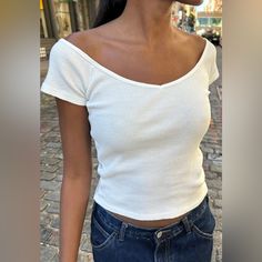 Ribbed Fitted Wide V-Neck Basic Short Sleeve Top. Fabrics: 100% Cotton Measurements: 22" (56cm) Length, 15" (38cm) Bust Made In: China Casual White Fitted V-neck Top, Basic V-neck Crop Top For Spring, Spring Basic V-neck Crop Top, Casual Fitted White V-neck Top, Fitted Casual V-neck Top For Day Out, Fitted Short Sleeve V-neck Top For Day Out, Brandy Melville Sweatshirt, Oversized Quarter Zip, Top Fabrics