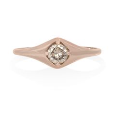 Our favorite new signet styled ring features a sparkling honey-champagne diamond set front and center. A round brilliant cut, this diamond offers all the fire of a classic white diamond but in a more subtle, warm hue. Great worn as a pinky ring or a full size ring! Approximately 0.28 carat. Set in 14K yellow, white or rose gold. Also available with a salt & pepper or white diamond upon request. Please contact us for customizations. Please contact us regarding expedited shipping times & rates in Heirloom Rose Gold Diamond Ring With Single Diamond, Rose Gold Diamond Signet Ring With Single Diamond, Classic Rose Gold Signet Ring With Single Diamond, Dome Ring With Rose Cut Round Diamonds, Dome Ring With Round-cut Rose Diamonds, Classic Rose Gold Diamond Signet Ring, Timeless Rose Gold Signet Ring With Diamond, Classic Diamond Signet Ring In Rose Gold, Rose Gold Signet Ring With Single Diamond