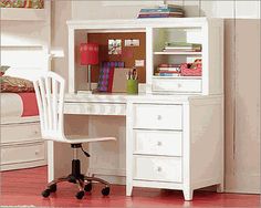 a white desk with a chair next to it in a room that has pink floors