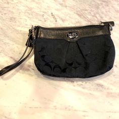 Coach Wristlet! New Without Tags So Pristine Condition. Black Fabric With The Coach “C” Print. Silver Zipper And Hardwares With Coach Logo On Front (See Photo). Black Wristlet With Zipper Closure For Evening, Black Wristlet For Evening, Evening Black Wristlet With Zipper Closure, Black Evening Wristlet With Zipper Closure, Coach Evening Wristlet With Zipper Closure, Coach Wristlet With Zipper Closure For Evening, Chic Black Coach Wristlet, Chic Black Wristlet With Zipper Pouch, Coach Black Wristlet For Evening