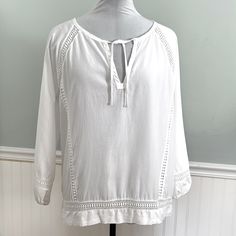 Never Worn. White Prana Peasant Pullover Blouse. Round Neckline With 6" V And Fabric Ties. Crochet Open, See Through Accents. Long Slightly Balloon Sleeves With Elastic Cuff. Straight Hemline. Size: Large Measurements Are Approximate And Taken Laying Flat. Length: 26" Armpit-Armpit: 21" Sleeve: 23.5" From Collar Smoke Free Home. Casual Long Sleeve Peasant Top For Beach, White Relaxed Fit Peasant Blouse, White Peasant Blouse With Relaxed Fit, Relaxed Fit Long Sleeve Peasant Top For Vacation, Relaxed Fit Peasant Blouse For Beach, Casual Summer Tunic Peasant Top, Peasant Style Relaxed Fit Beach Blouse, Casual Tunic Peasant Top For Summer, Peasant Blouse With Relaxed Fit For Beach