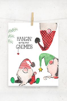 a christmas card with two gnomes hanging on a clothes line and the words hangin'with my gnomes