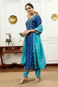 Blue kurta with a mirror, resham, tikki, aari and bead embroidered yoke, Paired with a pant and dupatta. - Aza Fashions Blue Palazzo Set With Straight Kurta For Diwali, Navratri Blue Kurta With Gota Work, Blue Palazzo Set For Diwali With Straight Kurta, Blue Bandhani Chanderi Salwar Kameez, Blue Straight Kurta Palazzo Set For Diwali, Blue Bandhani Print Chanderi Salwar Kameez, Bollywood Style Blue Kurta With Bandhani Print, Blue Bandhani Print Churidar For Diwali, Blue Churidar With Mirror Work And Straight Kurta