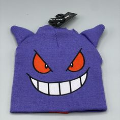 Pokemon Gengar 3d Ears Beanie Gengar, We Choose You! Keep Cozy While Heading To The Pokmon Gym With This Knit Beanie On. It Features Gengar's Face Embroidered And Comes With 3d Details Up Top. * 100% Acrylic * Imported Crochet Helmet, Pikachu Cap, Pokemon Beanie, Pikachu Hat, Pokemon Hat, Green Pokemon, Beanie With Ears, Gengar Pokemon, Team Valor