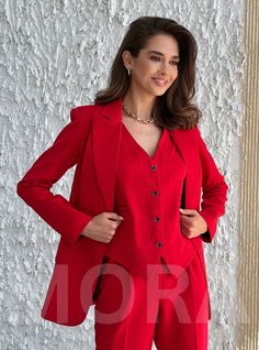 Suits are available in 6 major sizes according to our size chart. Model's wearing a size 4 2 US numeric  BUST 32-34 inches or 82-86 cm WAIST 23-24.8 inches or 59-63 cm HIPS 33-35 inches or 86-90 cm 4 US numeric  BUST 34-35 inches or 86-90 cm WAIST 25-26 inches or 63-67 cm HIPS 35-37 inches or 90-94 cm 6 US numeric  BUST 35-37 inches or 90-94 cm WAIST 26-28 inches or 68-71 cm HIPS 37-38.5 inches or 94-98 cm 8 US numeric  BUST 37-38.5 inches or 94-98 cm WAIST 28-29.5 inches or 71-75 cm HIPS 38.5-41 inches or 98-104 cm XL = 10 US numeric BUST 38 ½ - 39 1/3 inches or 98-100 cm WAIST up to 30,7 inches or 78 cm HIPS up to 44 inches or 112 cm XXL = 12 US numeric BUST 39 1/3 - 40,1 inches or 100-102 cm WAIST up to 33 inches or 84 cm HIPS up to 44,8 inches or 114 cm Blazer length is 27,1 inches or Red Single Breasted Sets For Workwear, Red Single-breasted Sets For Work, Womens Office Wear, Red Office, Woman Suit, Womens Office, Office Women, Womens Suits, Office Wear Women