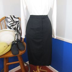 Nwot (The Pockets Are Still Sewn Shut) Classic Black A-Line Skirt. Front Zip With Two Button Closure, Side Pockets, And A Left Side Vent. Fully Lined. No Flaws Found. Material And Size Tags Missing, Feels Like A Wool/Cashmere Blend Fabric. Fits Like Size 8-10. Size / Measurements Taken While Flat - 8-10p Waist: 15” Hips: 21" Length: 26" Mid Calf On 5'3" Woman. Currently Hanging In A Bag Waiting For The Right Person. Open To Reasonable Offers. Classic High Waist Denim Skirt, Classic Black Skirt With Buttons, Fitted Black Skirt For Daywear, Vintage Black Pencil Skirt, Black A Line Skirt, Classy Vintage, Black Skirt, A Line Skirt, A Bag