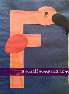 a flamingo made out of construction paper with the letter f on it's side