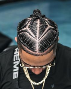 Discover the bold and stylish world of freestyle braids for men! Elevate your look with intricate braided designs that showcase your individuality and creativity. Explore endless possibilities and unleash your inner trendsetter with freestyle braids. #MenWithBraids #FreestyleBraids #MenHairstyles Men Cornrows Design, Mens Twists, Freestyle Braids, Different Types Of Braids, Braided Designs, Man Braids