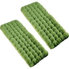 two green cushions sitting on top of each other