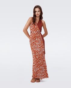 Made from a cotton-blend jersey, the Chase dress has a soft, light feel. This sleeveless piece has a halter neck, an open back, and a V-neckline. A combination of a print and a solid hue, its waist is cinched by a matching tie. Mary is 5 Foot and 7 Inches and wearing a size 2. Wrap Dress Dvf, Knit Wrap Dress, The Chase, Midi Wrap Dress, Wrap Dress Floral, Mini Wrap Dress, Maxi Wrap Dress, Knee Length Dresses, Soft Light