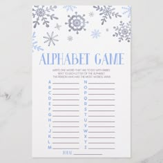 a printable snowflake alphabet game on a marble surface with the words'alphabet game'written in blue