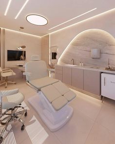 a modern dental room with white furniture and lighting