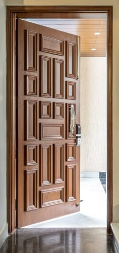 an open wooden door in a room