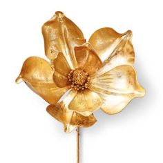 a golden flower on a white background