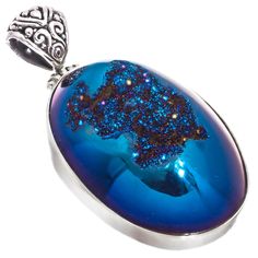 925 Sterling Silver Oval Cobalt Blue Titanium Druzy Agate Sterling Pendant, 1 7/8"    Bail Size:  4mm Silver Type:  Solid 925 Sterling silver Pendant Size:  47x25mm(1 7/8x1") incl bail Pendant Material:  Cobalt blue titanium druzy agate  Note:  No guesswork! You receive the actual piece pictured. Blue Oval Agate Jewelry, Blue Oval Pendant Jewelry With Polished Finish, Blue Oval Pendant With Polished Finish, Oval Blue Agate Jewelry, Blue Oval Cabochon Gemstones, Oval Blue Cabochon Gemstones, Blue Oval Sterling Silver Gemstones, Blue Oval Cabochon Gemstones For Gifts, Blue Oval Cabochon Jewelry With Polished Finish