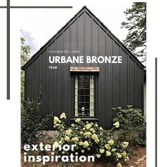 the front cover of urban bronze magazine, featuring an image of a black building with white trim