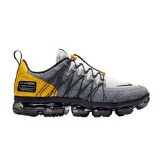 Find NIKE Air Vapormax Run Utility ' Amarillo on Editorialist. Nike released the Air VaporMax Run Utility 'Grey Amarillo' in Winter 2019. Nike modifies the innovative design of the Air VaporMax and retools it for enduring outdoor wear. The shoe's Grey-hued upper is constructed with a water-repellent textile highlighted by Amarillo accents and an informational tag at the heel. Its toggle lacing system and a bubble VaporMax Air sole provide extra support and comfort. Vapormax 2019, Nike Air Vapormax Flyknit, Racing Shoes, Air Vapormax, Nike Air Vapormax, Sneaker Collection, Outdoor Wear, Air Max Sneakers, Shoe Brands