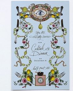 a card with an eye surrounded by flowers and other things on it's side