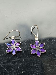 Really pretty, 8mm across, hypoallergenic drop earrings. Produced by a now dissolved company called iceBronze in the period between 2011 and 2018. I stocked these in my online shop for many years and they sold well. Selling off the remaining stock on here. Lovely rich purple colour. The earwires are solid sterling silver. Purple Flower-shaped Sterling Silver Earrings, Purple Flower Sterling Silver Earrings, Purple Sterling Silver Flower Earrings For Gift, Gift Purple Flower Earrings In Sterling Silver, Purple Flower-shaped Nickel-free Jewelry, Purple Nickel-free Flower-shaped Jewelry, Purple Nickel-free Flower Jewelry, Purple Flower Shaped Earrings, Purple Flower Charm Earrings