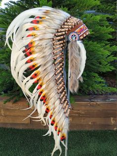 Medium Indian Headdress Replica made with real painted Swan feathers and white Rooster feathers This great adult headdress is entirely handmade and truly adorable. Perfect photography prop for your special ocasion. Ties in the back for a perfect fit. This will be precious for your costume, or even room decor. Head circumference: 59 centimeters / 23 inches ✈️ Worldwide shipping 🐤 I only use authentic feathers ⛺️ I guarantee highest quality, 100% hand-crafted White Ostrich Feather Headpiece With Feather Trim, White Bohemian Costume Hats And Headpieces For Festivals, White Bohemian Costume Hat For Festivals, Indian Headdress Tattoo, Indian Artifacts For Sale, Swan Feathers, Headdress Art, Choctaw Indian, American Indian Crafts