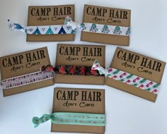 four camp hair ties are laid out on top of each other, with the words camp hair written across them