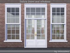 two white double doors and windows in front of a brick building with the words pelica doors and windows above them