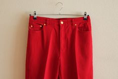 "Ralph Lauren Pants Red Pants Red Women's Pants Red Denim Pants Denim Trousers Red Ralph Lauren Denim Pants Jeans Pants High Waist Shown on model M/L Label size: 12 Measurements(lying flat): Waist: 16.5\"/ 42 cm Length: 41\"/ 104 cm Inseam: 29.5\"/ 75 cm From crotch to waist line: 12\"/ 30.5 cm Hips: ~20.5\"/ 52 cm Condition: Great Vintage Condition Material: 99% cotton,1% lycra Please check measurements to insure a proper fit. Remember to allow yourself some extra room for movement. You can com Retro Red Cotton Bottoms, High Rise Red Jeans For Spring, Red High Rise Jeans For Spring, Red High-rise Jeans For Spring, Red Full-length Jeans For Spring, Red High Rise Jeans With Pockets, Red Straight Leg Jeans For Spring, Red High-waisted Jeans For Spring, Red High Rise Jeans With Five Pockets