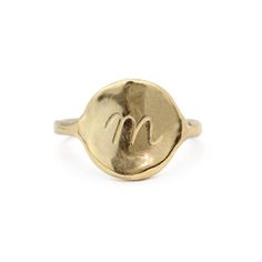 An interpretation of the classic signet ring with a hand carved initial to make it extra special. Simple and feminine with a fluid feel. Inspired by the artist Georgia O'Keeffe. Please scroll product photos to see each initial's font style. DETAILS hand cast 14k yellow, white, or rose gold (please select your metal) ½ inch face Single hand etched initial (please choose below) Please note all Initial Rings are MADE TO ORDER and take 2-4 weeks to ship. Timeless Everyday Initial Ring, Elegant Sterling Silver Hand Forged Signet Ring, Elegant Hand Forged Sterling Silver Signet Ring, Hand Forged Sterling Silver Signet Ring, Elegant Oval Hand Forged Signet Ring, Elegant Hand Forged Oval Signet Ring, Elegant Hand Forged Open Signet Ring, Hand Forged Elegant Oval Signet Ring, Hand Forged Oval Signet Ring