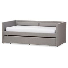 the daybed has two drawers on each side and is made from grey fabric with white sheets