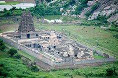 an aerial view of a temple in the jungle