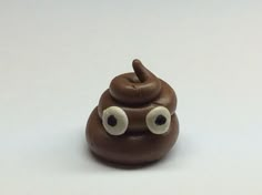 a chocolate poop with googly eyes on it