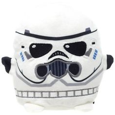 a white stuffed toy with a black nose and glasses on it's face,