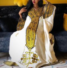 Gondar Fetil Ethiopian Gondar Amhara Yellow Embroidery Fetil Dress - Etsy Festive White Dress With Gold Embroidery, Gold Embroidered Dresses For Traditional Ceremonies And Festivals, Traditional V-neck Dress With Intricate Embroidery, White Dress For Eid Celebration, White Floor-length Dress With Gold Embroidery, White Floor-length Dress For Celebration, White Dress With Gold Embroidery For Eid, Festival Dresses With Geometric Embroidery, Ceremonial Floor-length Embroidered Dresses