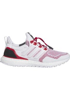 the adidas running shoe in white with red and black details on the upper part