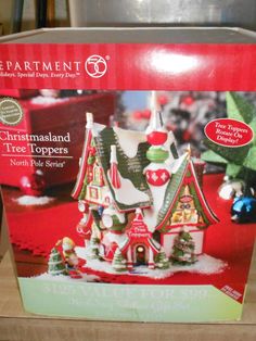 a christmas tree topper is shown on the cover of a magazine, with other holiday decorations